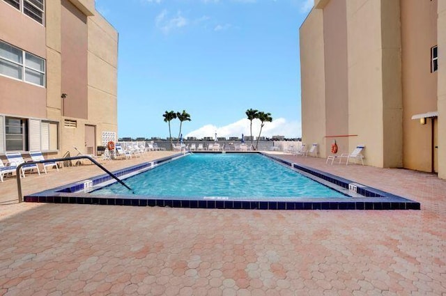 view of pool with a patio area