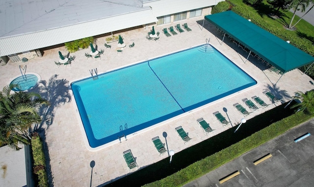 community pool featuring a patio