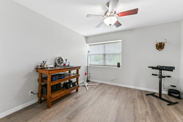 interior space with light wood-type flooring and ceiling fan