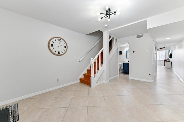 interior space featuring light tile patterned floors