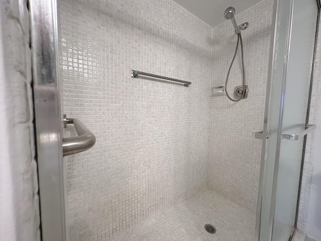 bathroom featuring an enclosed shower