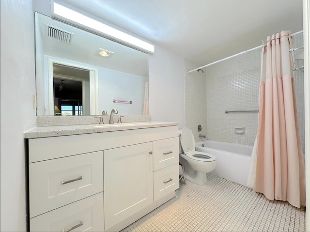 full bathroom with vanity, shower / tub combo, tile patterned floors, and toilet