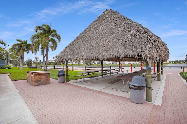 surrounding community featuring a gazebo and a lawn