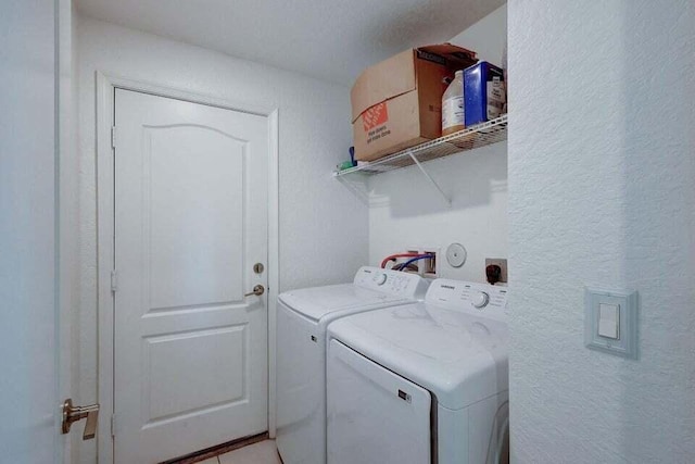 laundry area with washer and clothes dryer