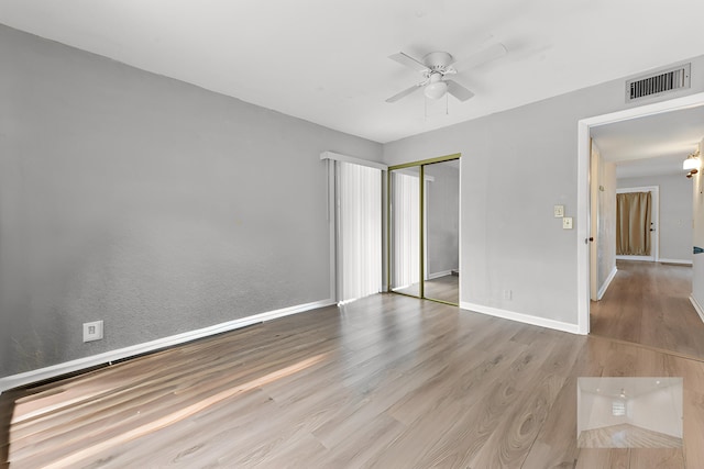 364 Capri H, Delray Beach, FL 33484 - unfurnished bedroom with light hardwood / wood-style flooring, ceiling fan, and a closet