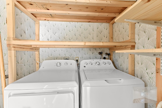 364 Capri H, Delray Beach, FL 33484 - washroom featuring washing machine and clothes dryer and wood ceiling