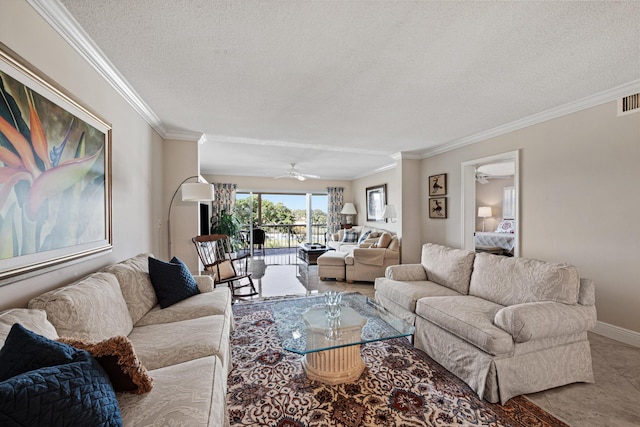 living area with crown molding, a textured ceiling, ceiling fan, baseboards, and visible vents