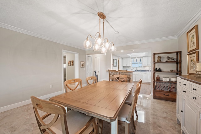 dining space with ornamental molding and a textured ceiling