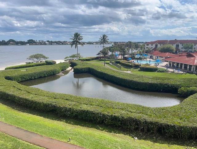 view of home's community with a water view