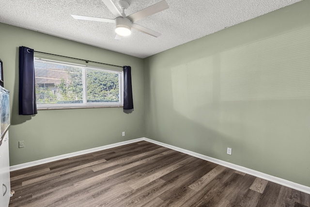 spare room featuring a ceiling fan, a textured ceiling, baseboards, and wood finished floors