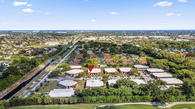 birds eye view of property with a residential view