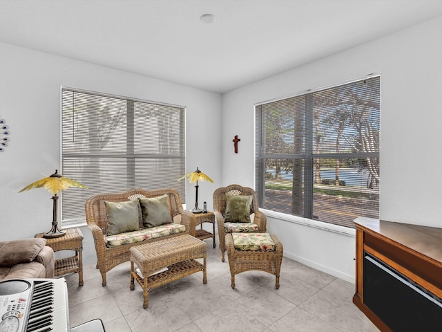 sitting room featuring light tile patterned flooring