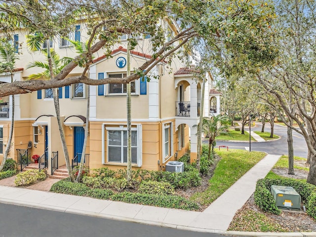 view of front of property with central AC