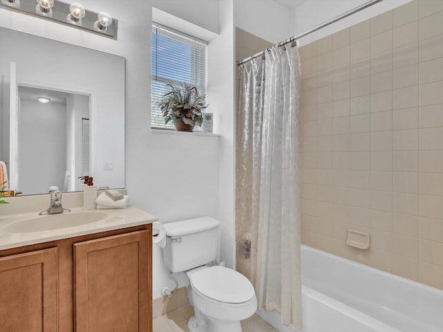 full bathroom with vanity, tile patterned flooring, toilet, and shower / bath combo with shower curtain