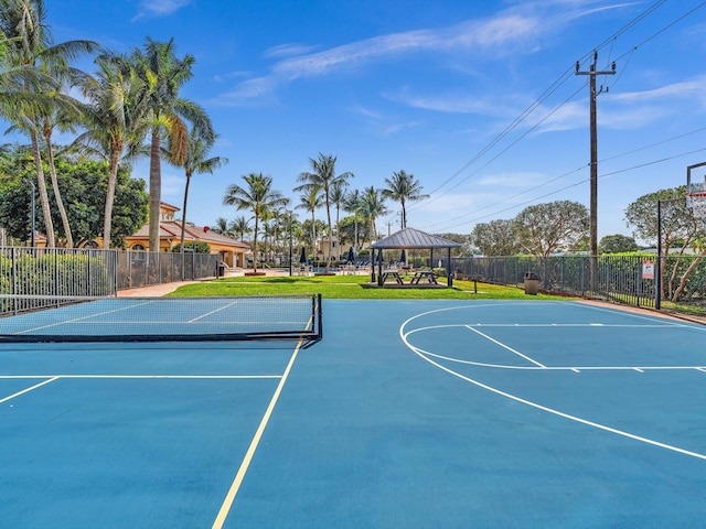 view of tennis court with a gazebo and basketball court