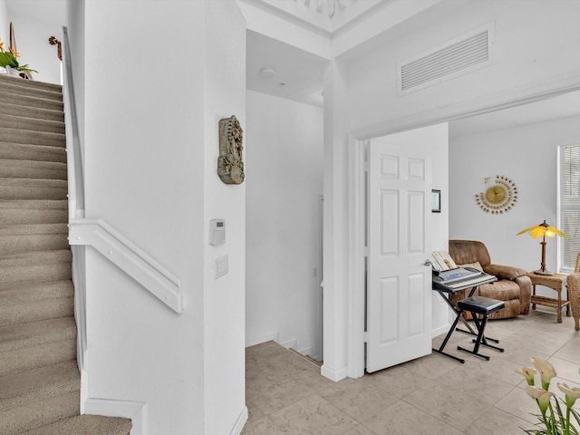 interior space featuring light tile patterned floors