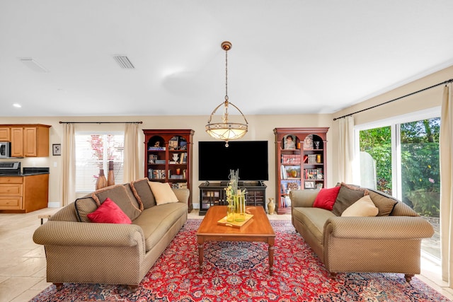 living room featuring plenty of natural light