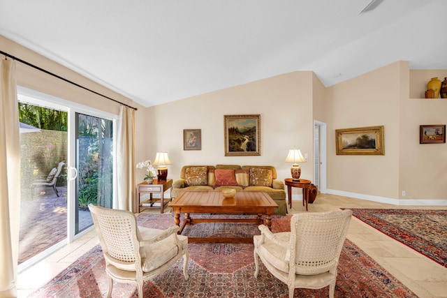 living room featuring vaulted ceiling