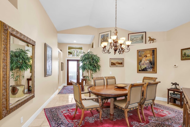 dining space featuring high vaulted ceiling