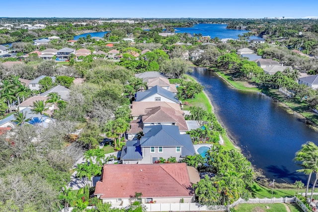 drone / aerial view with a water view