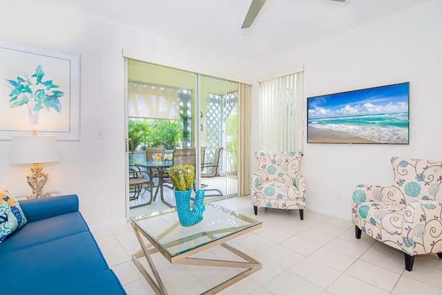 tiled living room with ceiling fan