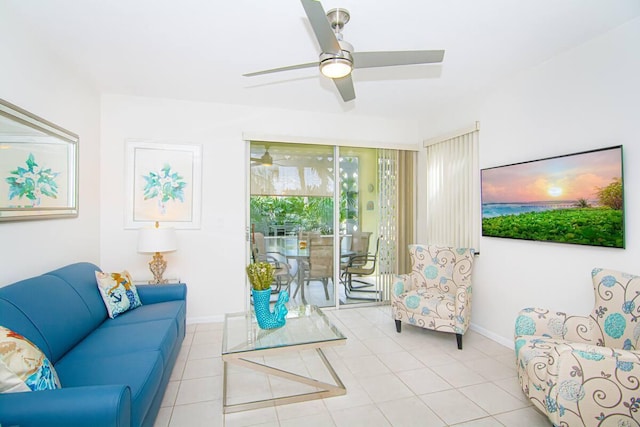 living room featuring light tile patterned floors and ceiling fan