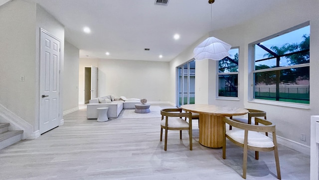 dining room with light hardwood / wood-style floors