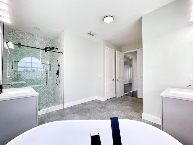 bathroom featuring vanity and separate shower and tub