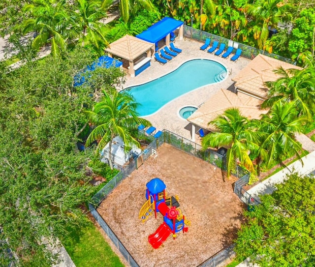 view of swimming pool featuring a community hot tub, a gazebo, and a patio