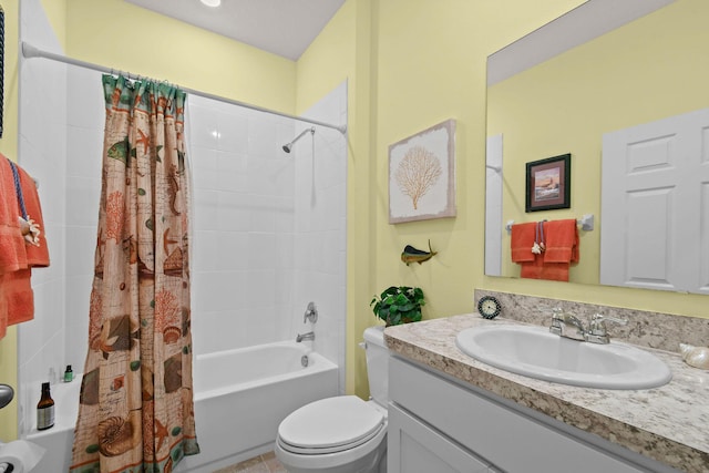 bathroom featuring shower / bath combo, vanity, and toilet