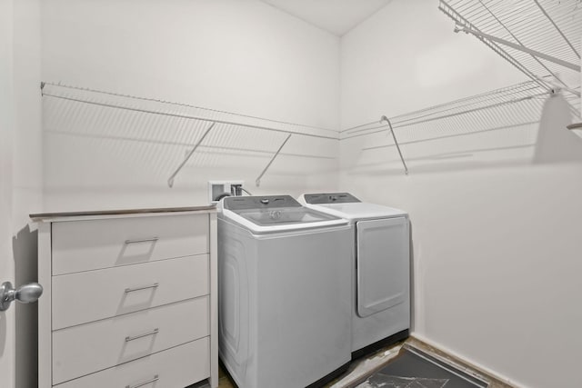laundry area with washer and dryer and laundry area