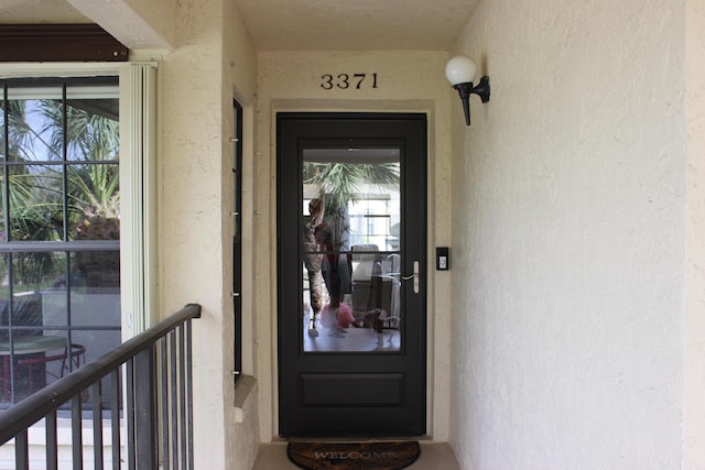 3371 Jog Park Dr, Greenacres, FL 33467 - entrance to property featuring a balcony