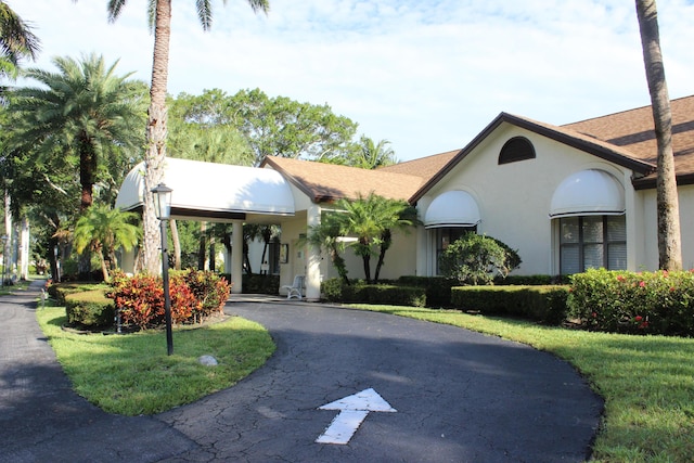 3371 Jog Park Dr, Greenacres, FL 33467 - single story home with a front lawn