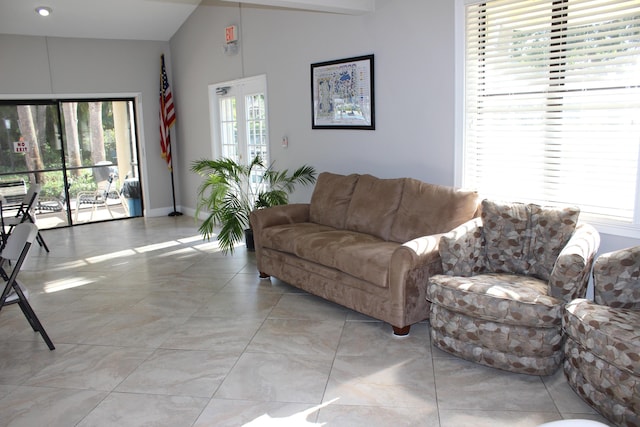 3371 Jog Park Dr, Greenacres, FL 33467 - tiled living room with lofted ceiling