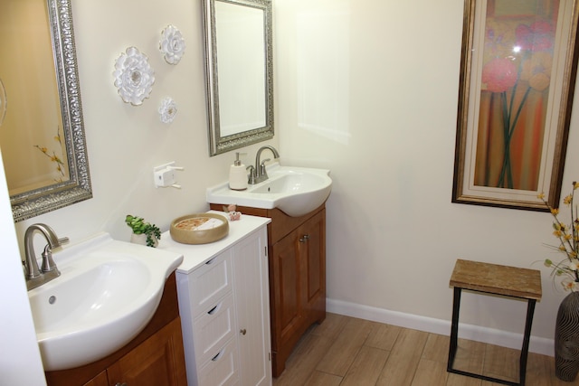 3371 Jog Park Dr, Greenacres, FL 33467 - bathroom featuring vanity and hardwood / wood-style floors