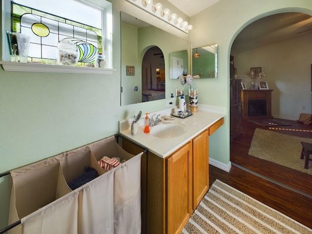 bathroom with vanity and hardwood / wood-style floors