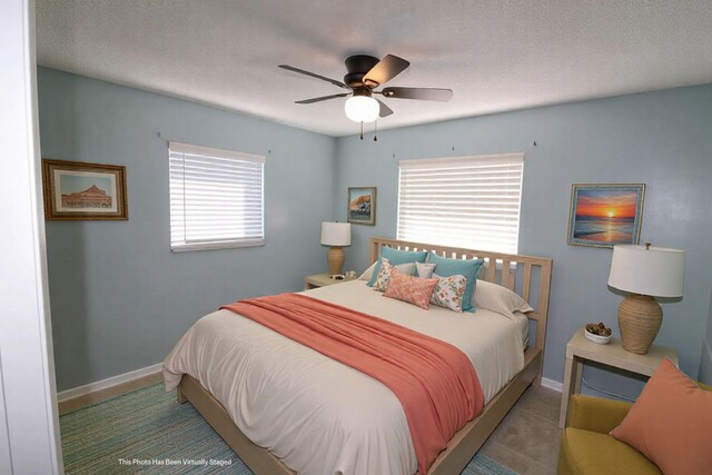 empty room with ornamental molding, dark hardwood / wood-style floors, and a textured ceiling