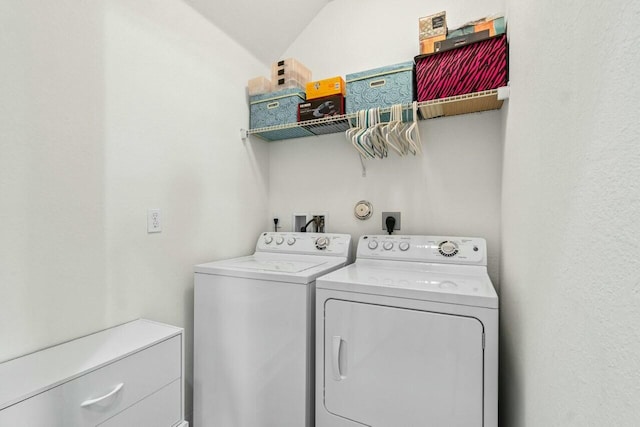 laundry area featuring laundry area and washing machine and clothes dryer