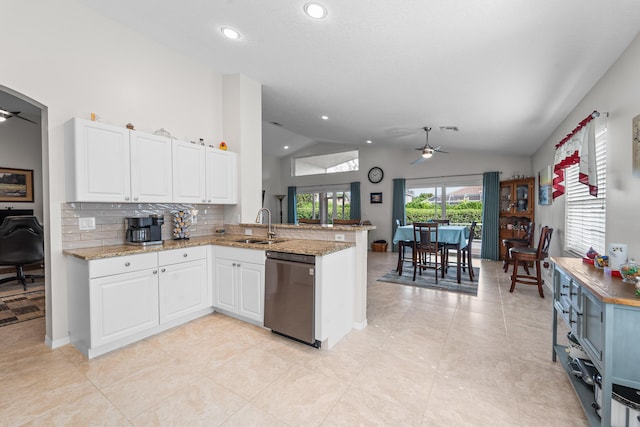 7087 Lombardy St, Boynton Beach, FL 33472 - kitchen featuring a peninsula, stainless steel dishwasher, white cabinetry, a ceiling fan, and a sink