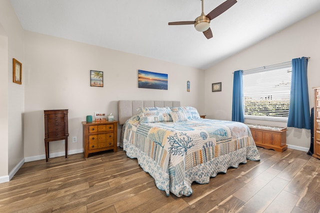 7087 Lombardy St, Boynton Beach, FL 33472 - bedroom featuring wood finished floors, a ceiling fan, baseboards, and vaulted ceiling