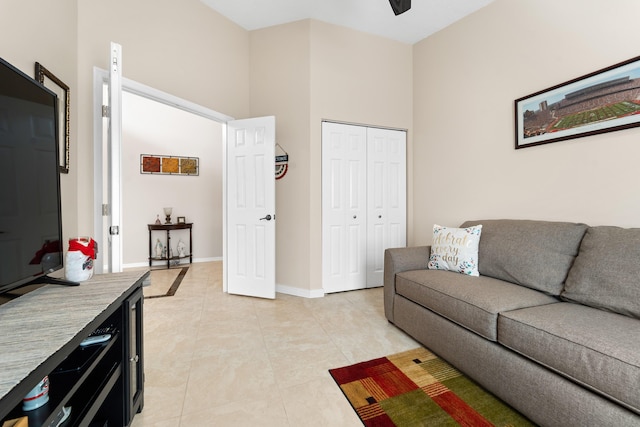 7087 Lombardy St, Boynton Beach, FL 33472 - living room featuring light tile patterned flooring and baseboards