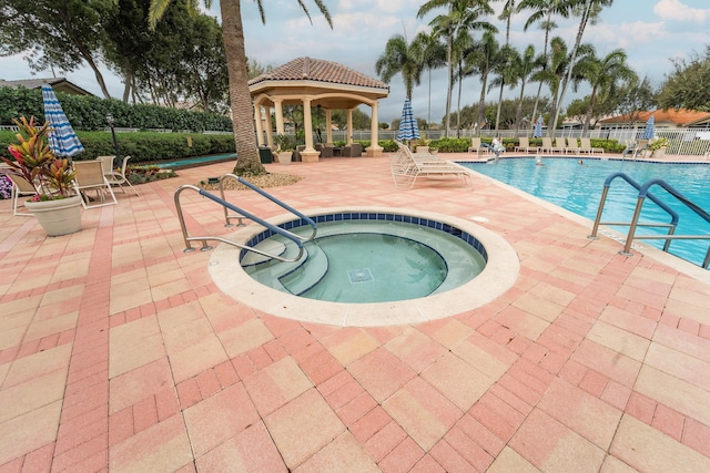 7087 Lombardy St, Boynton Beach, FL 33472 - community pool with a gazebo, a patio area, a community hot tub, and fence