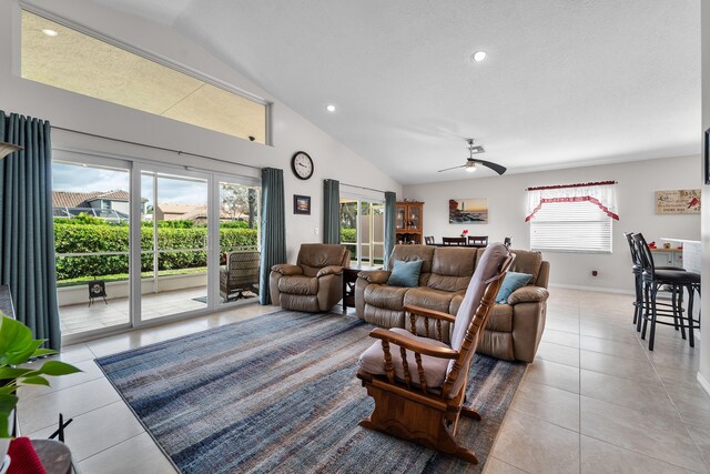 7087 Lombardy St, Boynton Beach, FL 33472 - living room featuring recessed lighting, light tile patterned floors, baseboards, ceiling fan, and vaulted ceiling