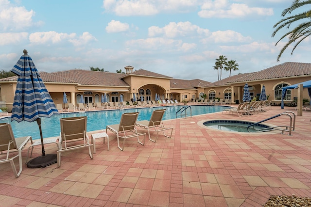 7087 Lombardy St, Boynton Beach, FL 33472 - pool featuring a patio area and a community hot tub