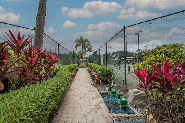 7087 Lombardy St, Boynton Beach, FL 33472 - view of property's community featuring a tennis court and fence