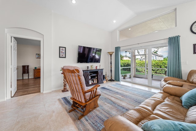 7087 Lombardy St, Boynton Beach, FL 33472 - living room with light tile patterned floors, baseboards, high vaulted ceiling, and recessed lighting