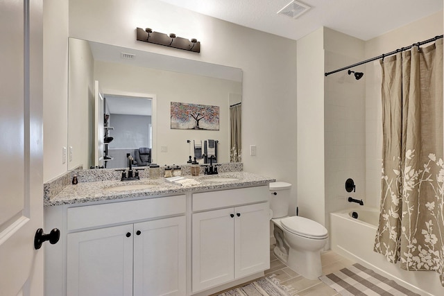 bathroom with shower / bath combo, visible vents, a sink, and toilet