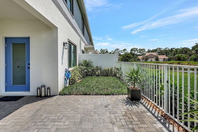 view of patio with a fenced backyard