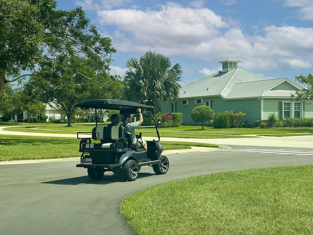 view of community with a lawn