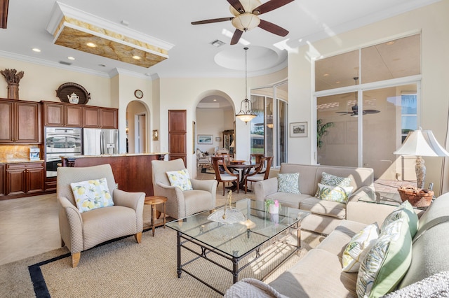 living room featuring visible vents, arched walkways, ceiling fan, crown molding, and recessed lighting